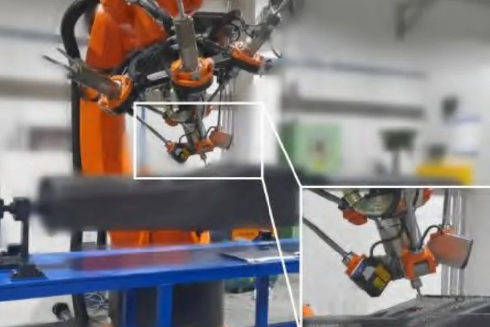 Công nghiệp vũ khí Trung Quốc đại nhảy vọt: Không một bóng người, nhà máy sản xuất UAV vận hành hoàn toàn bằng robot - ảnh 1