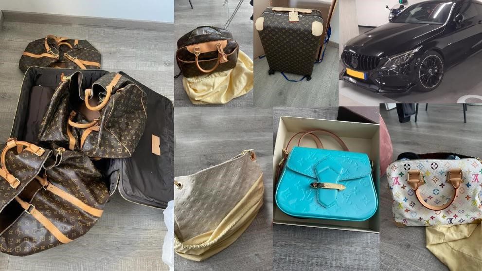 Thu giữ khẩn cấp số hàng hiệu trị giá hơn 6 tỷ cùng 217 triệu tiền mặt tại trụ sở một doanh nghiệp - ảnh 1