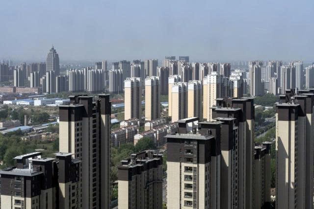 Lãi suất thế chấp ở Trung Quốc bất ngờ tăng lần đầu tiên kể từ 2021, 'dội gáo nước lạnh' vào thị trường BĐS - ảnh 1