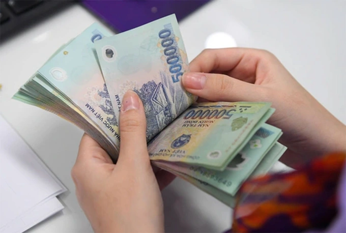 Lương hưu nhận qua tài khoản ngân hàng có phải đóng thuế thu nhập cá nhân không? - ảnh 2