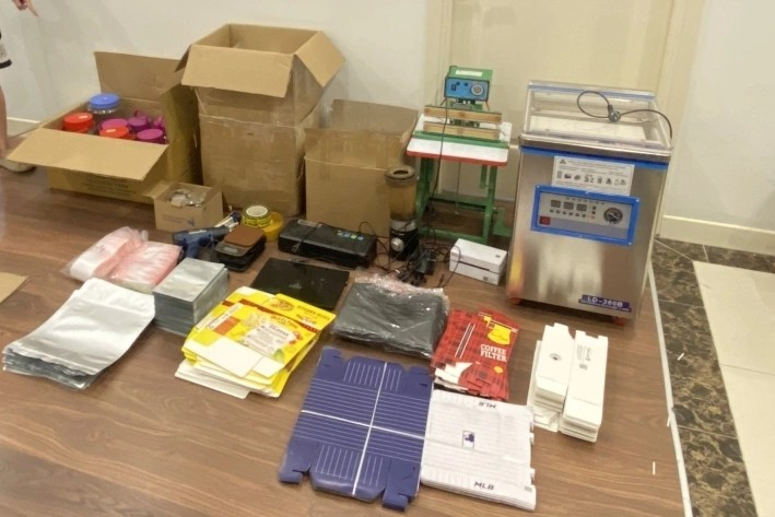 Công an bắt Nguyễn Phi Cơ và 25 đồng phạm, tịch thu 2 xe ô tô cùng 7,5 tỷ đồng - ảnh 2