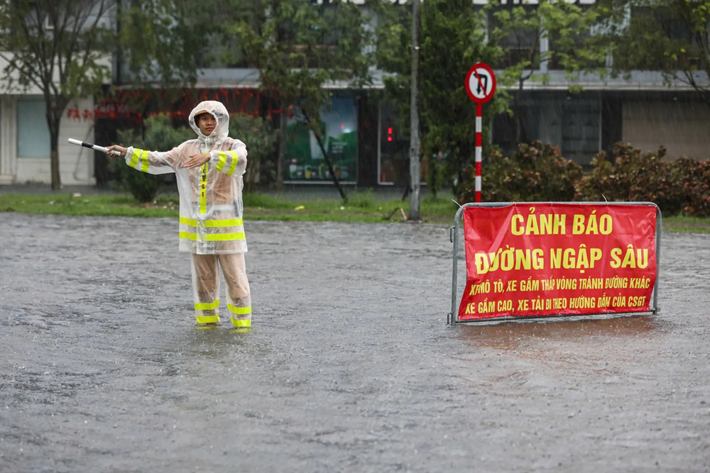 ‎Công an Hà Nội khuyến cáo người dân trước tình huống úng ngập - ảnh 2