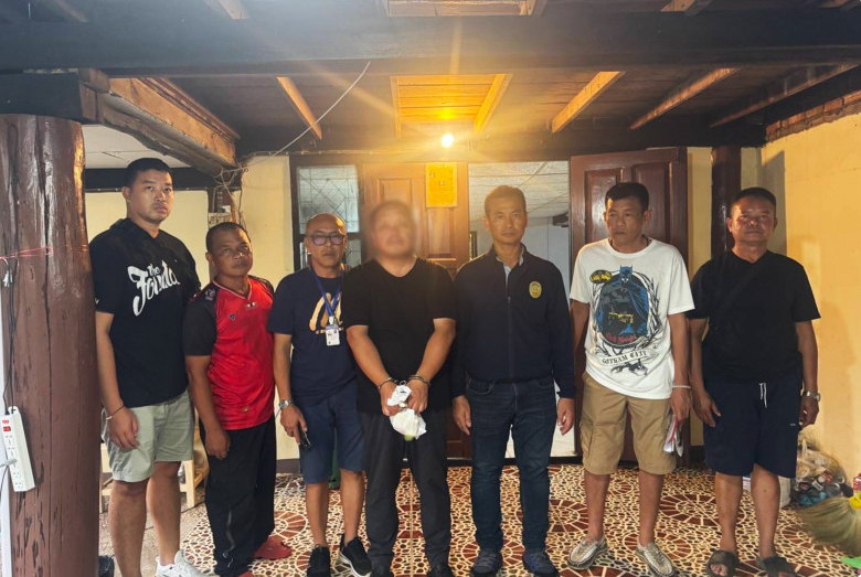 Bắt khẩn cấp người đàn ông Trung Quốc rửa tiền hơn 1.200 tỷ đồng, trốn truy nã của Interpol  - ảnh 1