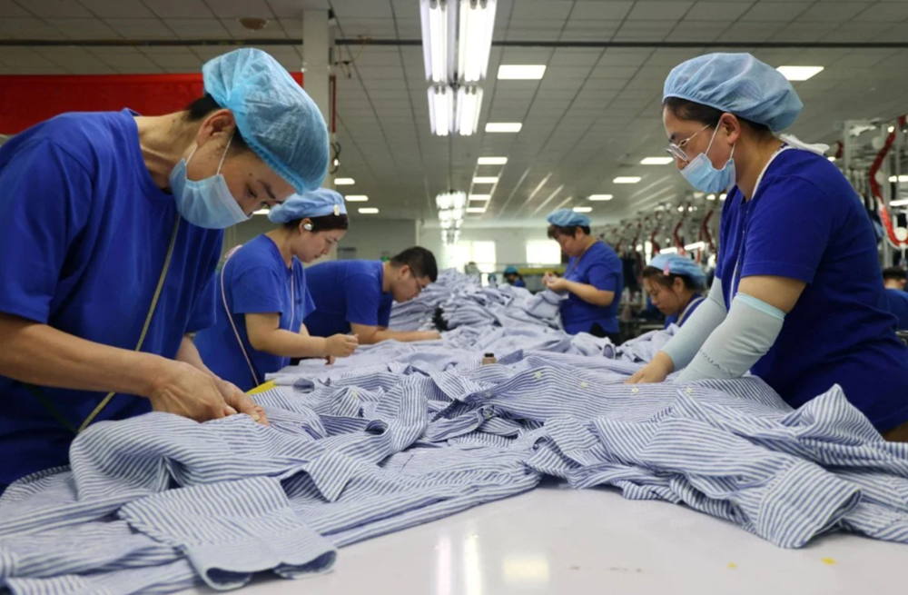 Trung Quốc sản xuất 1 tỷ tấn sợi dệt, gấp đôi trọng lượng loài người khiến thế giới chấn động - ảnh 1