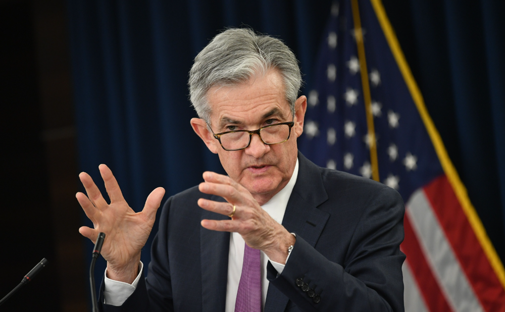 Fed hạ lãi suất giữa lúc thiếu dữ liệu kinh tế, tuyên bố thời điểm kết thúc chương trình thắt chặt định lượng - ảnh 1
