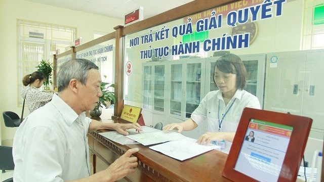 Hà Nội:Phấn đấu 100% đối tượng chính sách được trả trợ cấp không dùng tiền mặt