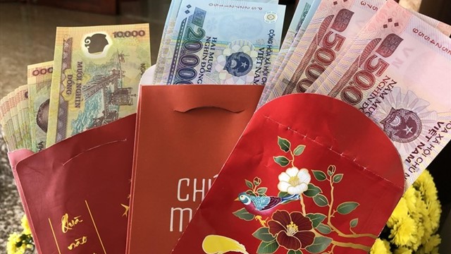 Cha mẹ thu tiền lì xì của con có thể bị phạt 30 triệu?